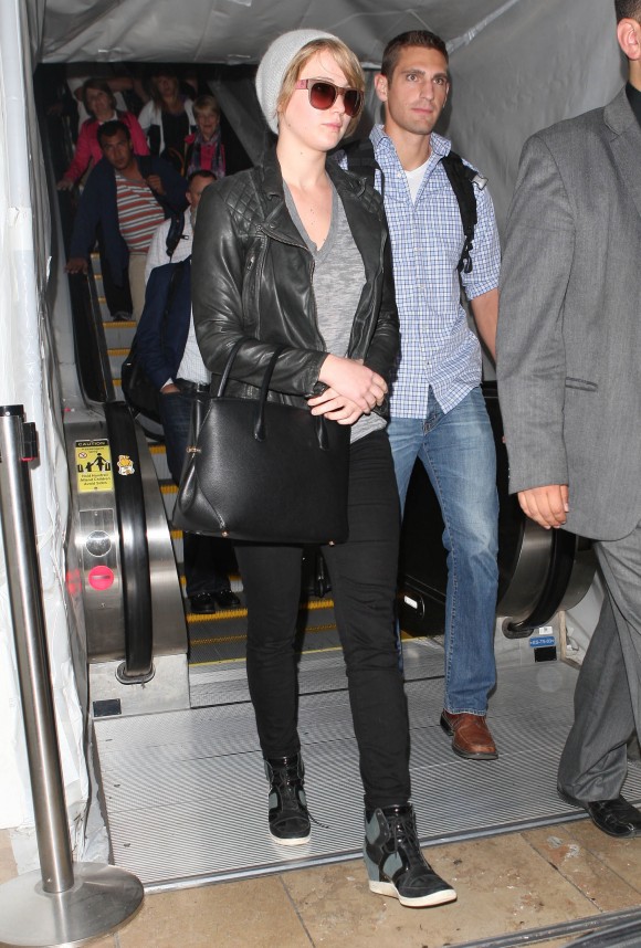 Jennifer Lawrence Arriving On A Flight At LAX